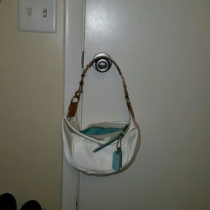 Small white with turquoise Coach purse