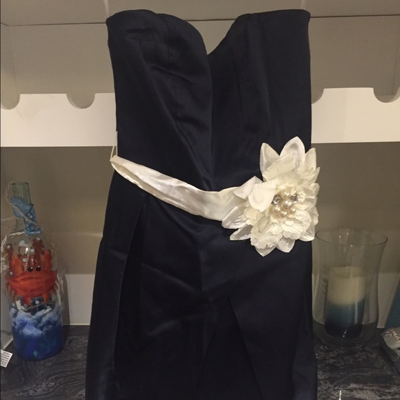 Navy formal dress with white flower ribbon tie