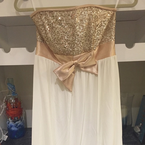 Gold and white formal dress.