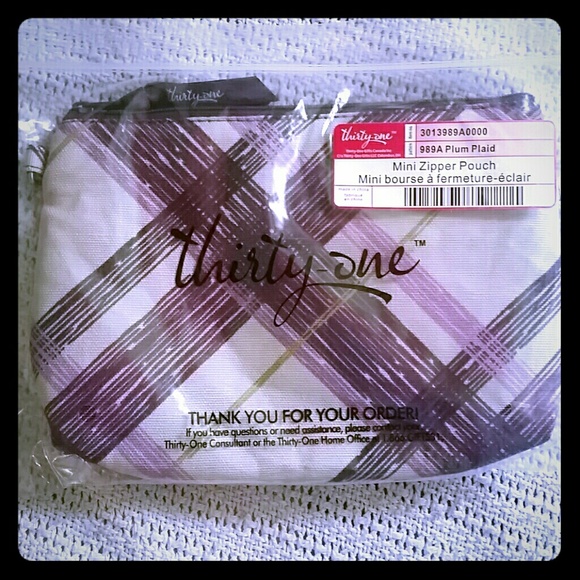 Mini zipper pouch by thirtyone