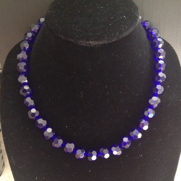Dark blue necklace with matching earrings