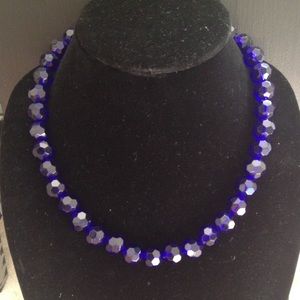 Dark blue necklace with matching earrings