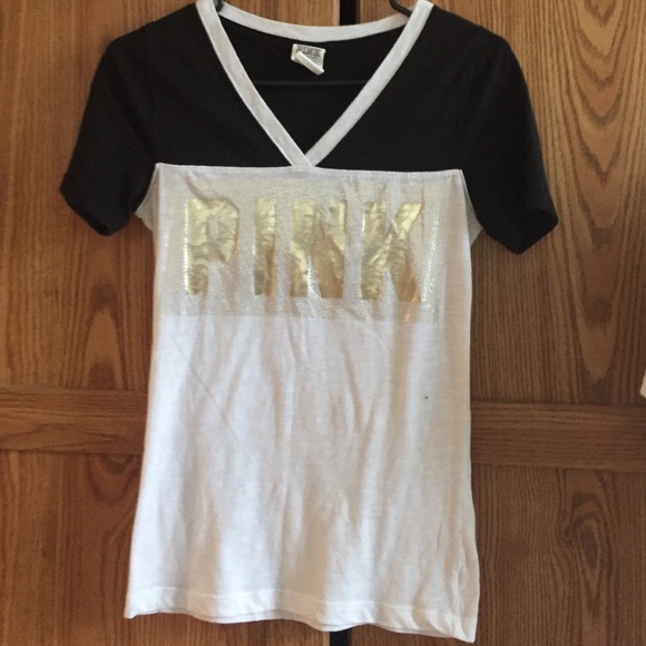 Black and white with gold lettering VS Pink tee