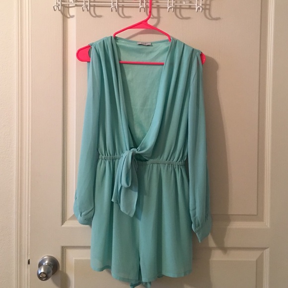 Low cut, sleeve cut out romper!