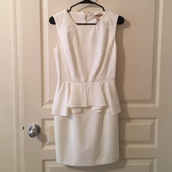 Cream dress with ruffle detailing!
