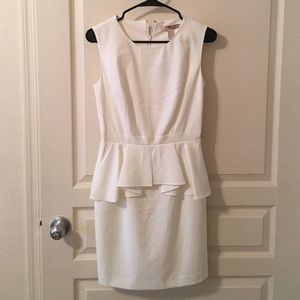 Cream dress with ruffle detailing!