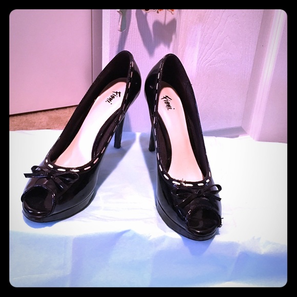 Black and cream laced four inch heels