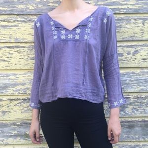 Peasant blouse with cross-stitch flowers