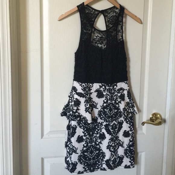 Classy black lace and de masque print dress