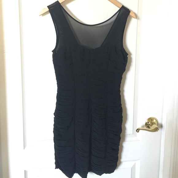 Sexy black dress with sheer chest area.