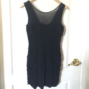 Sexy black dress with sheer chest area.