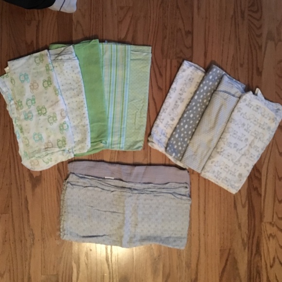 9 swaddle blankets never used. 2 grey not included
