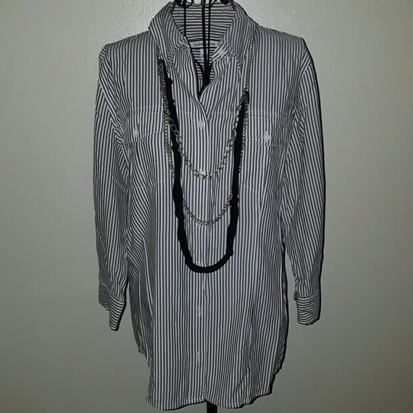Three quater length sleeve button up.