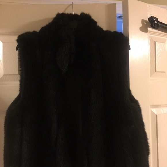 Reversible black faux fur blazer.