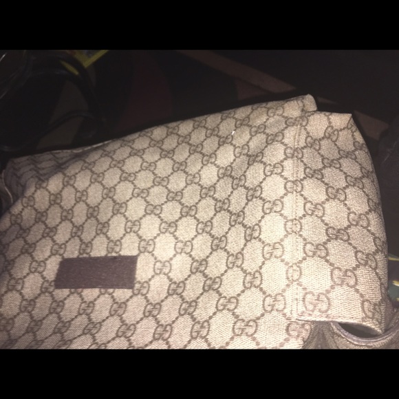 More pics of Gucci diaper bag.