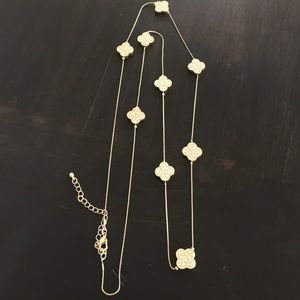Long gold necklace