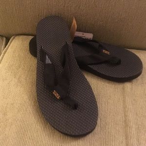 Women's Teva black flip flop