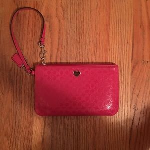 Hot pink coach wristlet