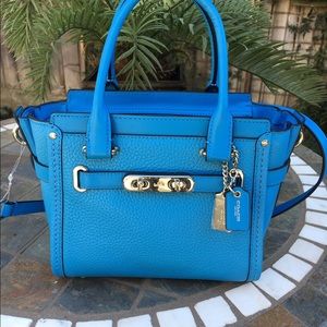 Coach purse. Brand new. 8 by 7.   Dust bag