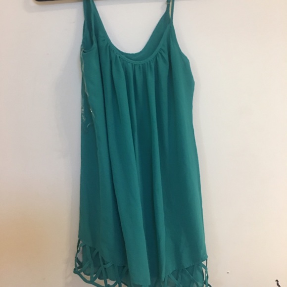 Turquoise dress with triangle cut outs