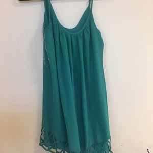 Turquoise dress with triangle cut outs