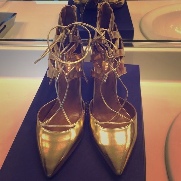 Aquazzura gold heels