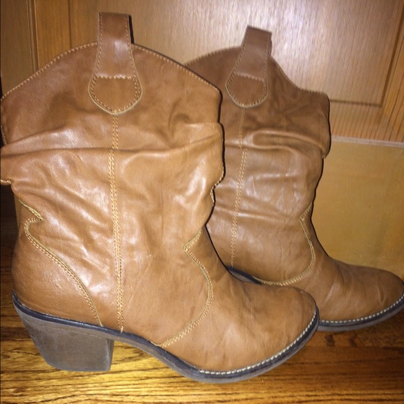 Short, brown cowgirl style boots.