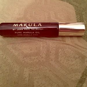 Travel size Marula rollerball pure oil.