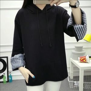 Sweatshirt with striped sleeve