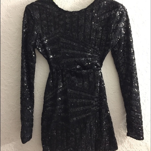 Black sparkly long sleeve homecoming dress