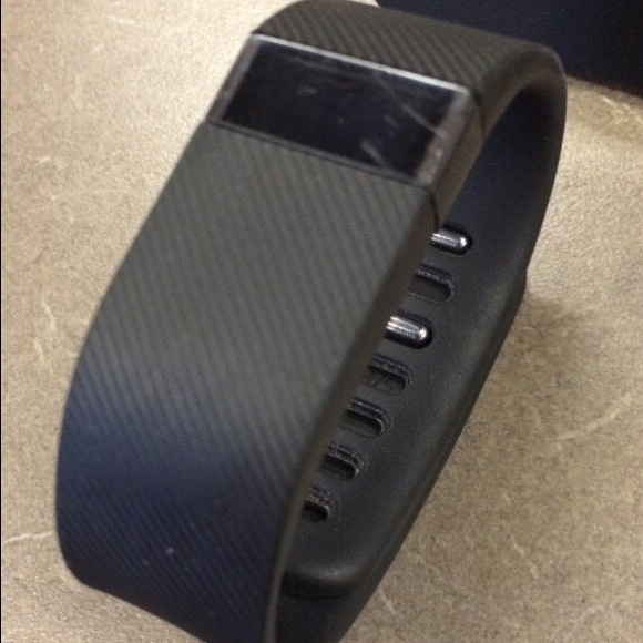 Black FitBit charge. Band size: small