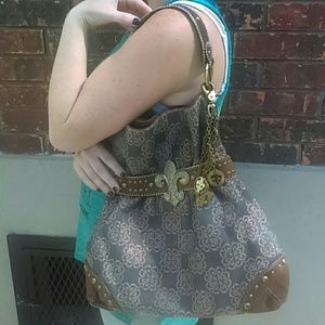 Kathy Van Zeeland Purse with Fleur de Lis accents