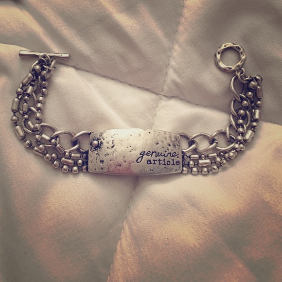 Silvertone "Genuine article" bracelet