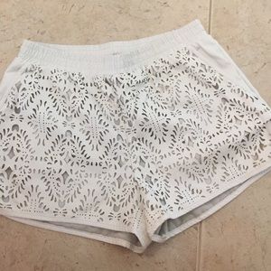 White lace leather shorts