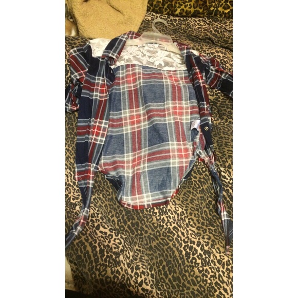 plaid button down shirt. worn once