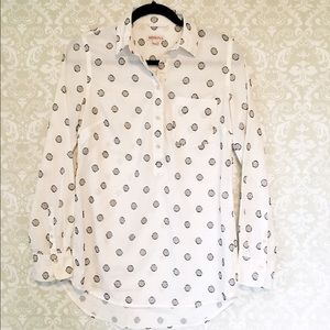 White and black popover tunic.