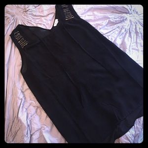 Black sheer tank top with detailed beading.