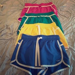 4 pairs of medium champion brand workout shorts!