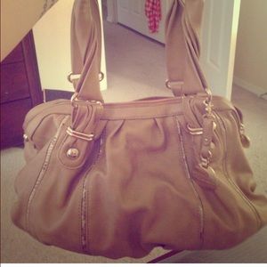 Jennifer Lopez Tan studded purse