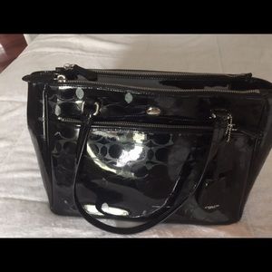 Coach black patent leather purse.
