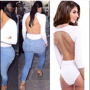 Super cute white bodysuit. Brand new