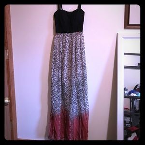 Size small, backless cheetah Maxi.