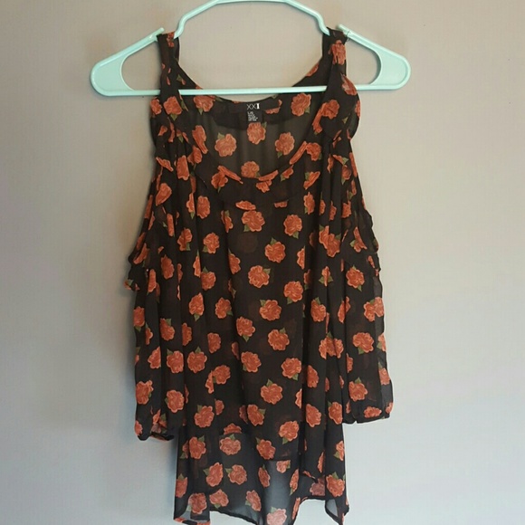 Open shoulder long sleeve blouse.