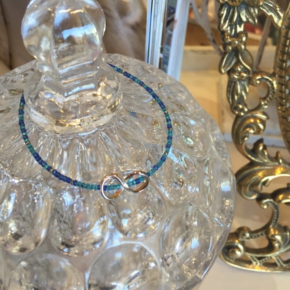 Delicate blue glass bead sterling infinity