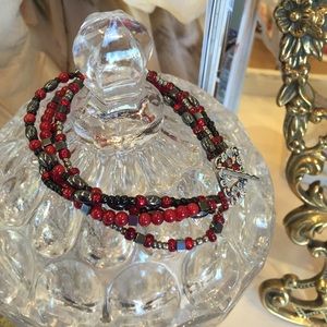 Coral, glass, and hematite bracelet. Red and black