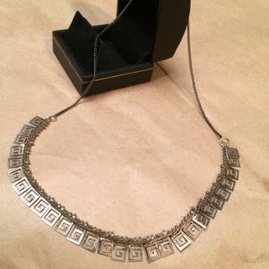 Vintage Maya influenced silver spiral necklace.