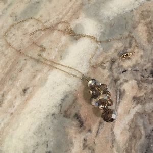 Gold pendant necklace with bronze crystal cluster