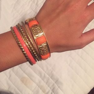 6 total gold and orange bangles