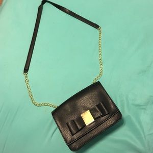 Gold and black chained purse