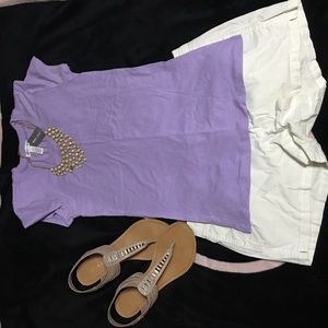 Purple shirt and white shorts